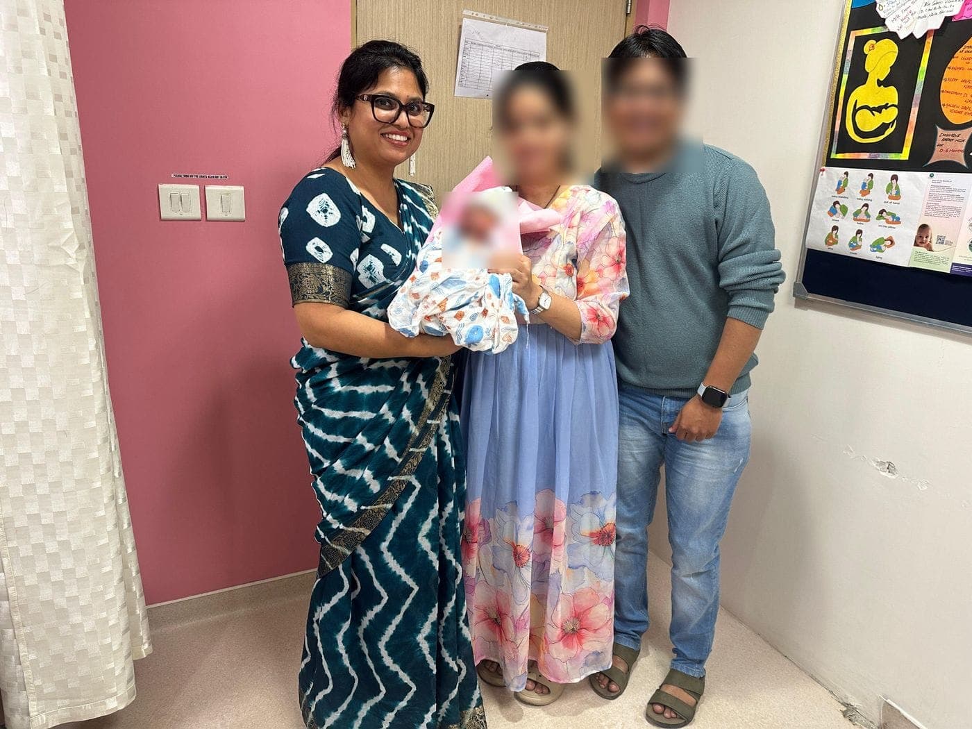 Dr. Nikita with a family at the clinic