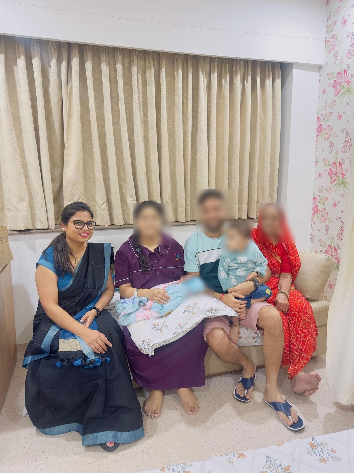 Dr. Nikita visiting a family in the ward