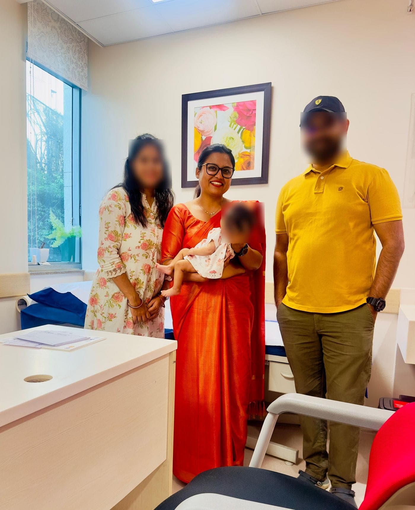 Dr. Nikita with a family in the consulting room